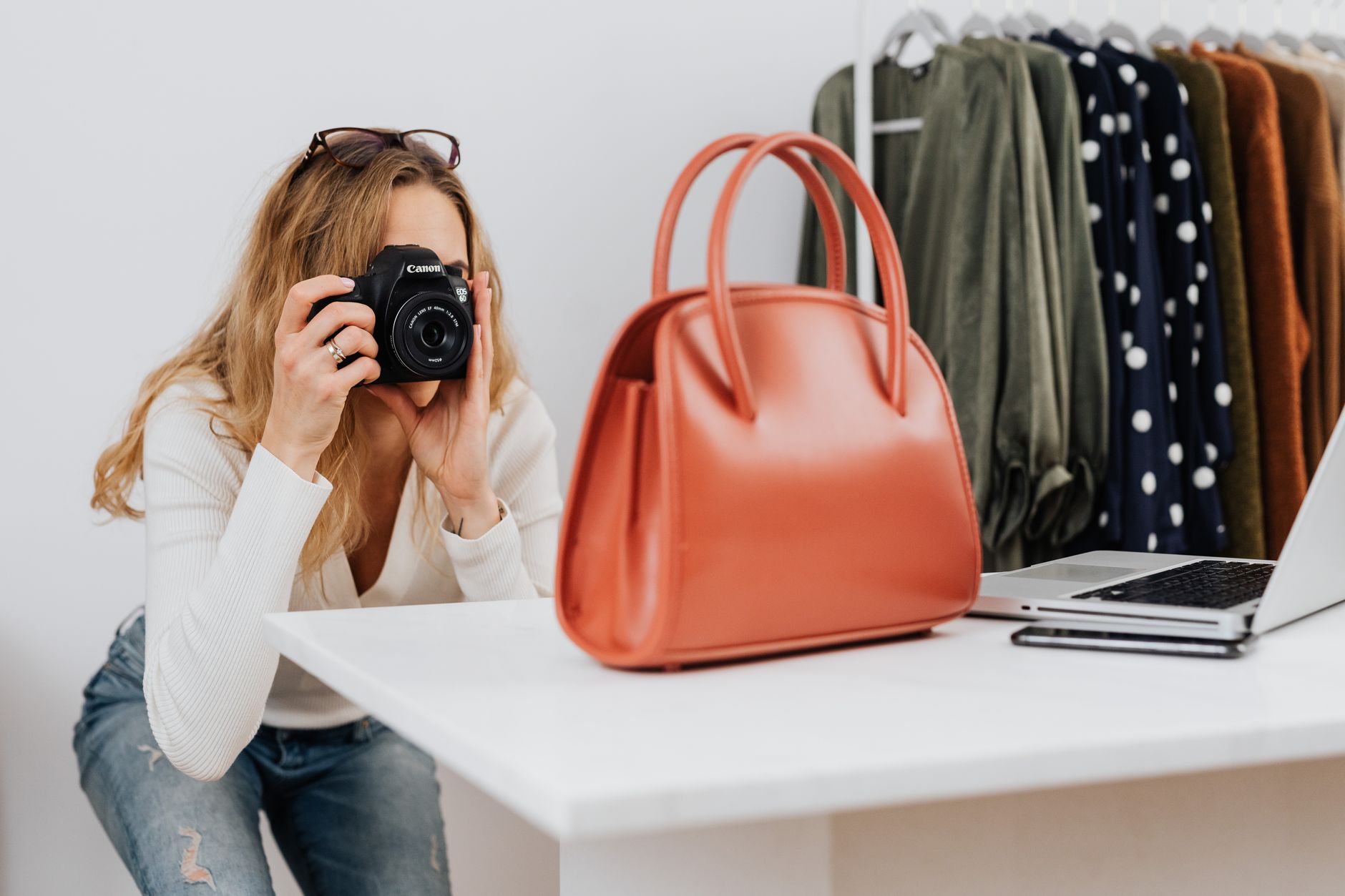 online marketplace seller taking product photos home