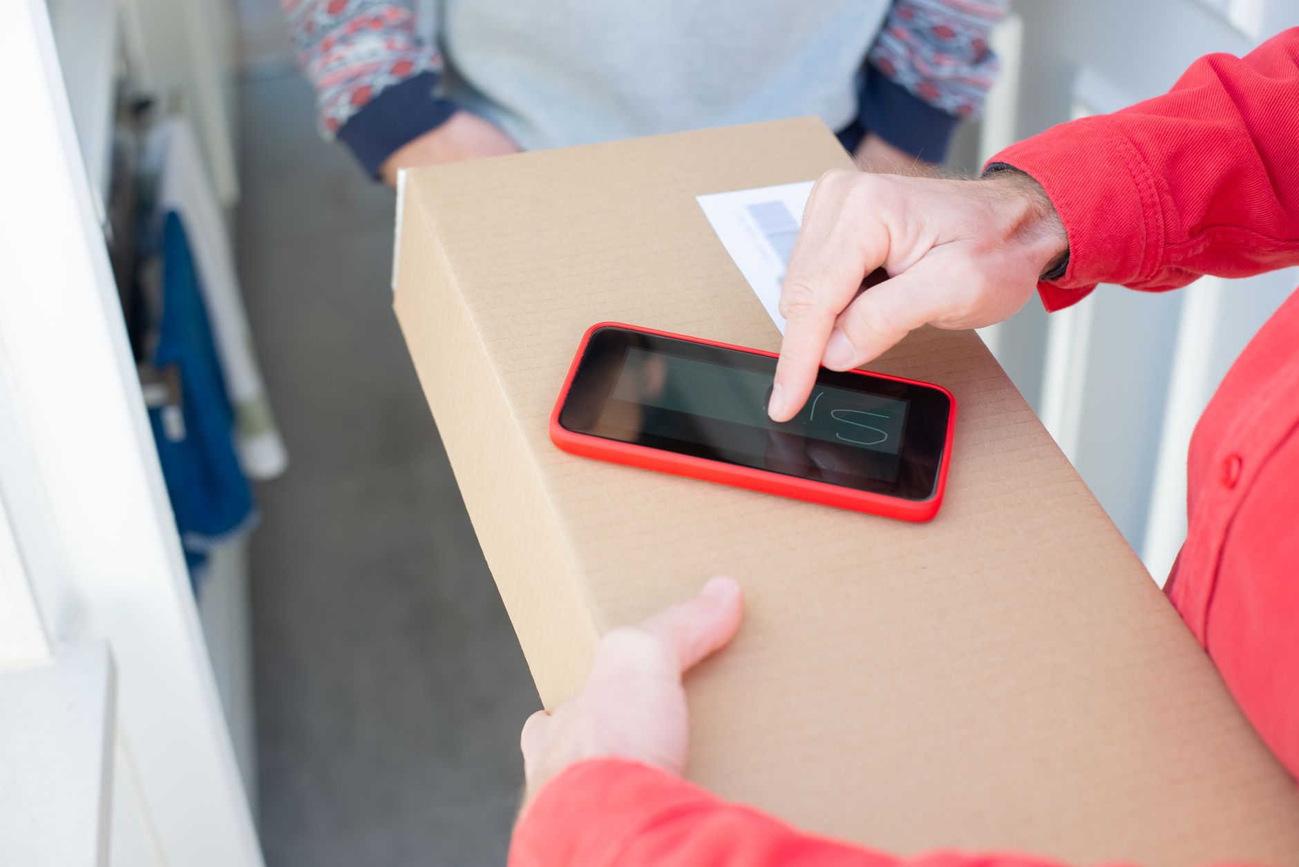 small business owner receiving customer review on smartphone